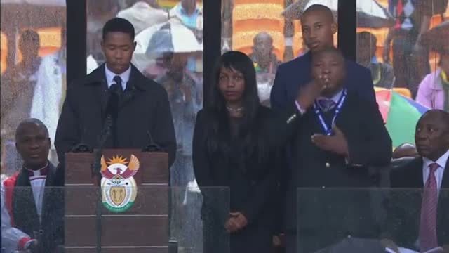 Watch Nelson Mandela memorial fake sign language interpreter - what he actually said - This is Genius Video
