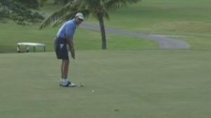 Watch US President Barack Obama enjoys a round of golf on holiday in Hawaii Video