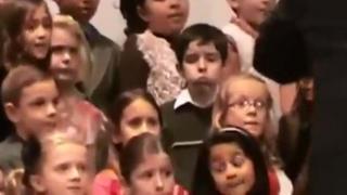 Watch Little Boy Barfs At His Christmas Concert Video