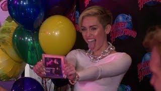 Watch Miley Cyrus Shares Racy Kissing Pic Video