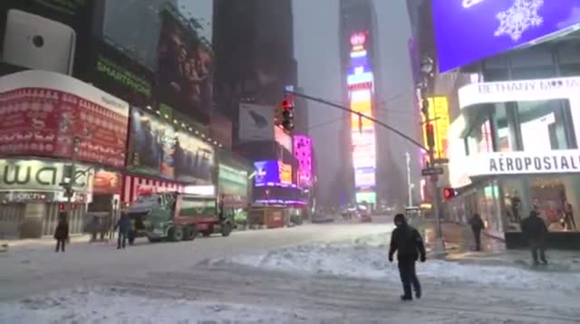 Watch Workers Begin Clearing Snow in Times Square Video