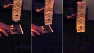 Watch Guy Successfully Removes Last Bottom Jenga Piece Without Collapsing Tower Video