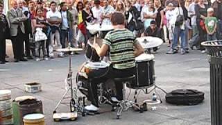 Watch Amazing Street Drummer Performer Video