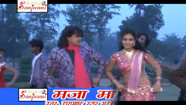 Watch New Hot Bhojpuri Holi Song "Choli Me Maja Lihata Mobile Dudh Piyata" By Guddu Rangila Video