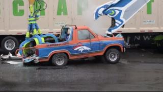 Watch Seahawks Fan Literally Destroys A Bronco Video