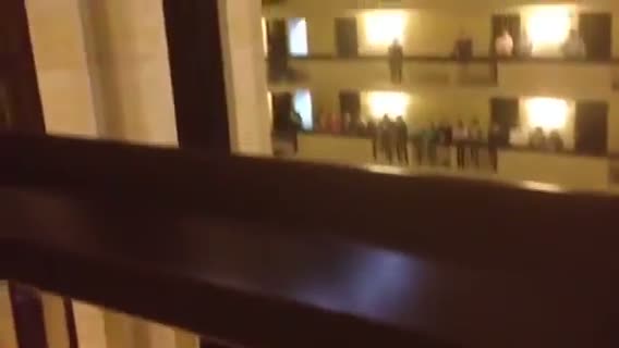 Watch 1,000 High School Students Sing US National Anthem on 18 Floors of Hotel Video Video