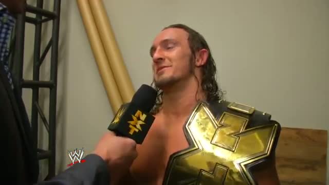 Watch Adrian Neville celebrates winning the NXT Championship Video