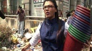 Watch Rakhi Sawant DISTRIBUTES DUSTBINS Video