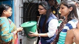 Watch Rakhi Sawant DISTRIBUTES FREE DUSTBINS Video