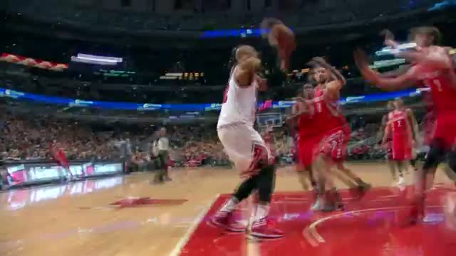 Watch NBA: Taj Gibson Dunks on Omer Asik! Video