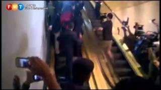 Watch MH370: China families dragged away by police Video