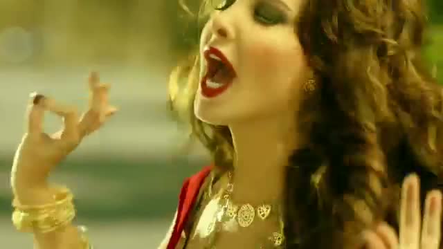 Watch Nancy Ajram - Ma Tegi Hena - Official Music Video  Video