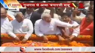Watch Varanasi: People on the streets to cheer Narendra Modi's roadshow Video