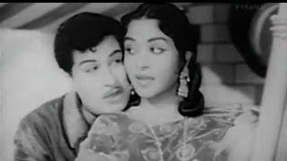 Watch M.G. R. & Saroja Devi Romantic Tamil Song - Vannakili Sonna Muzhi - Deivathai Video