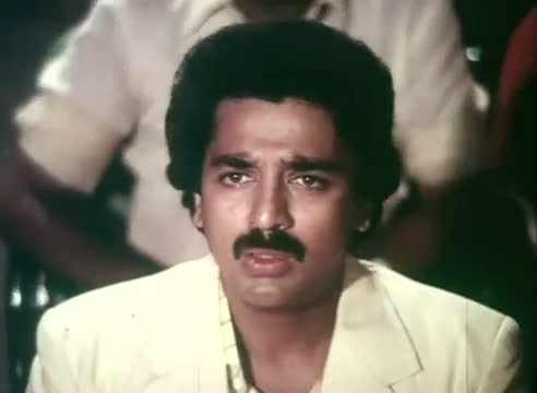 Watch Kamal Hassan - Enakkul Oruvan Movie Tamil Song Video