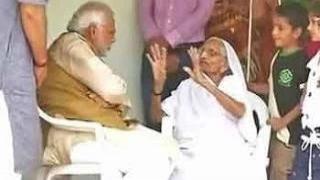 Watch Election Results 2014: armed with massive victory, Narendra Modi meets his mother Video