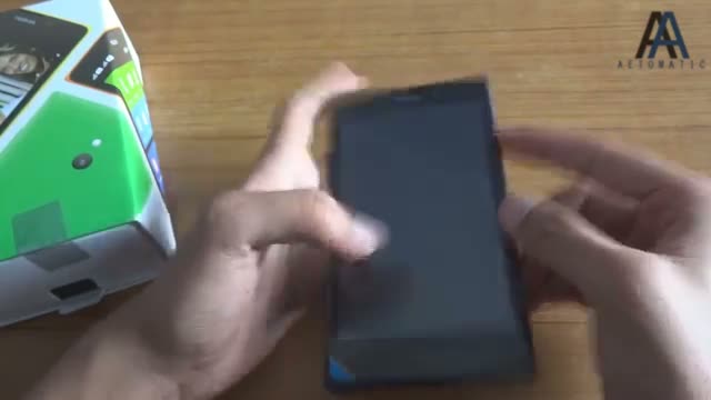 Watch Nokia XL Unboxing Video