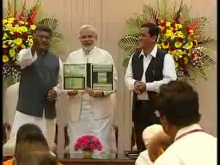 Watch PM Narendra Modi releases postal stamps on 2014 FIFA World Cup Video
