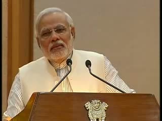 Watch PM Narendra Modi releases postal stamps on FIFA World Cup 2014 Video