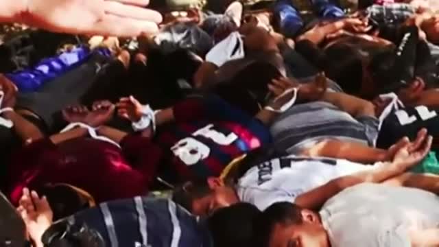 Watch Militants Post Images of Mass Killing in Iraq Video