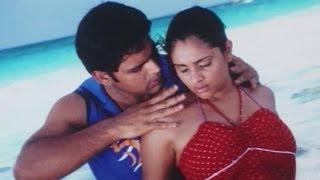 Watch Kadhal Kadavulai Pola (Full Tamil Song) - Thoondil Video