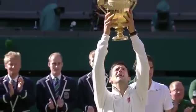 Watch Novak Djokovic receives the Wimbledon trophy - Wimbledon 2014 Video