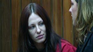 Watch Prostitute in Exec's Death Pleads Not Guilty Video