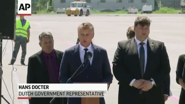 Watch Bodies of MH17 Victims Arrive in the Netherlands Video
