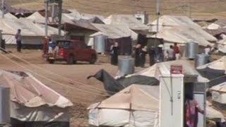 Watch Christians forced to flee ISIS in Iraq Video