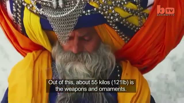 Watch Is This The World's Largest Turban? Man Wears 100lb, 645m Long Headdress Video