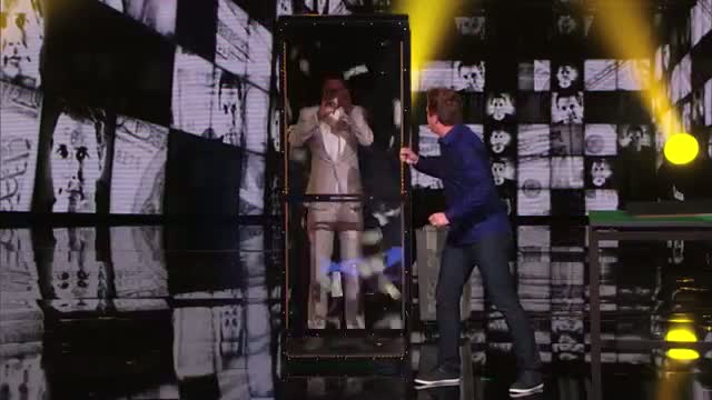Watch Mike Super: Magician Put Nick Cannon in a Money Machine - America's Got Talent 2014 Video