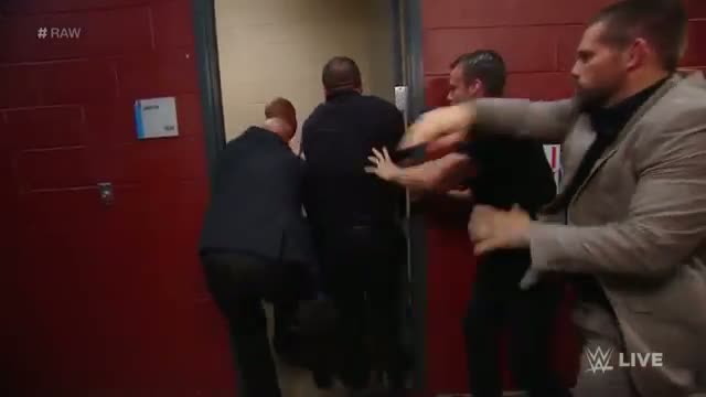 Watch Security restrains a seething Dean Ambrose: WWE Raw, Sept. 22, 2014 Video