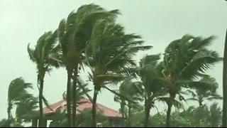 Watch Cyclone Hudhud loses speed as it crosses Andhra Pradesh Video