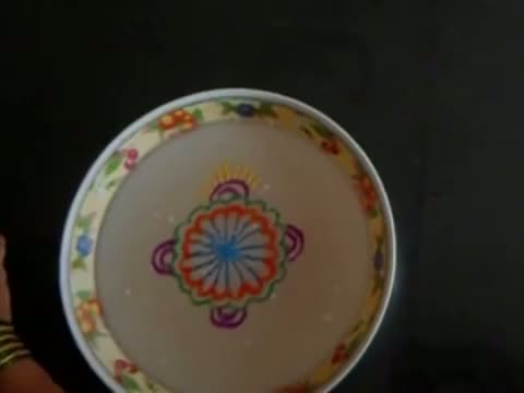 Watch Rangoli on water Diwali decoration idea Video