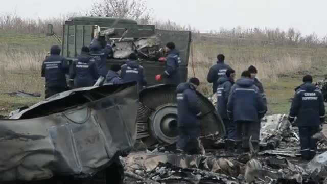 Watch Crews Start Collecting Debris From MH17 Site Video