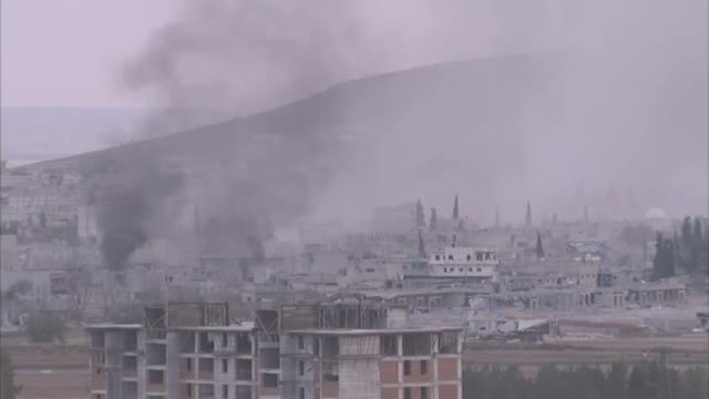 Watch Under Siege, Explosions Erupt in Kobani Video