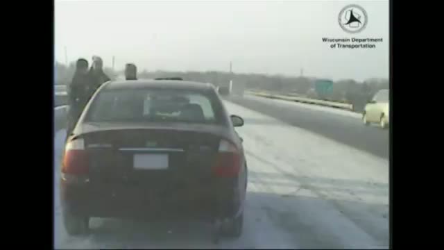 Watch Out of Control SUV Hits Police Car in Snow Video