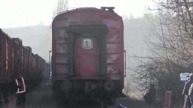 Watch MH17 Wreckage Leaves Ukraine on Train Video
