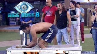 Watch Bigg Boss 8: Upen Patel Takes A Dip In Cow Dung | Yuck! Video