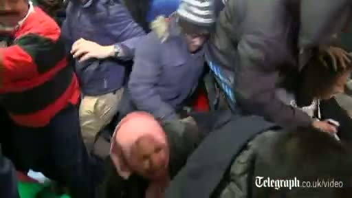 Watch Asda Black Friday madness as frantic shoppers fight over TVs Video