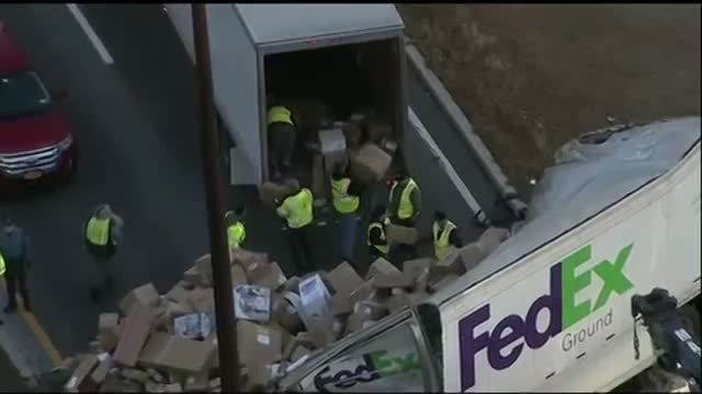 Watch Holiday Horror! FedEx Crash Litters NJ Roadway Video Video