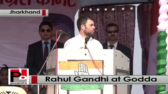 Watch Jharkhand - At Godda rally, Rahul Gandhi slams 'pro industrialist' Modi Video