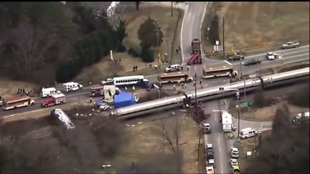 Watch Engine Overturns in N.C. Amtrak-truck Crash  Video