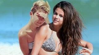 Watch Miley Cyrus Hides Behind Selena Gomez Video