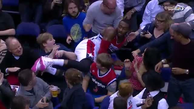 Watch NBA: John Wall Takes Flight Deep into the Crowd Video