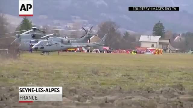 Watch Rescue Teams Gather Near Plane Crash Site  Video