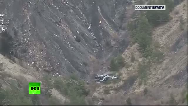 Watch Emergency helicopters buzz Germanwings 4U2595 crash site Video