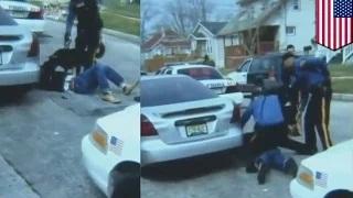 Watch Police dog attacks handcuffed man Phillip White, who later dies in custody Video