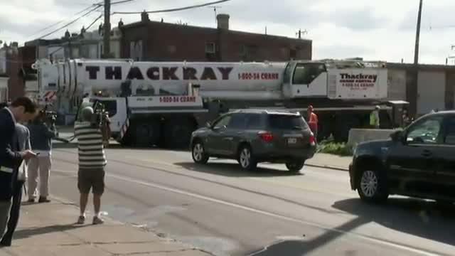 Watch Crane Arrives to Site of Philly Train Crash Video