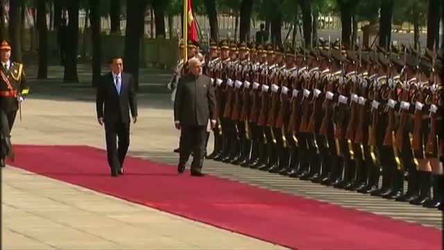 Watch China welcomes Indian PM Modi in Beijing ceremony Video